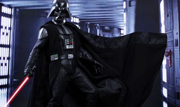 Darth Vader doing a dramatic cape sweep.