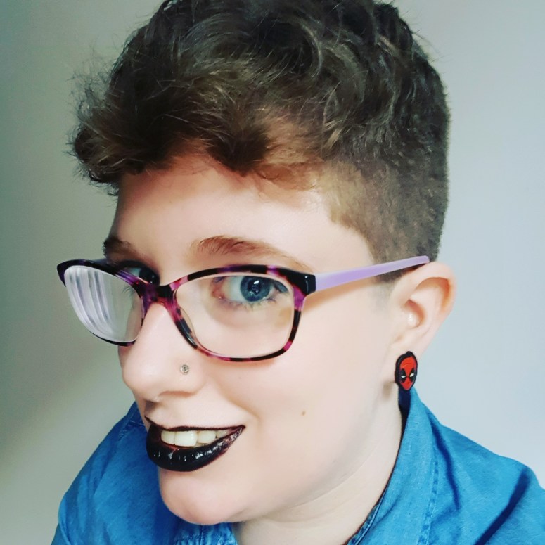 A selfie taken just after having my hair chopped off.