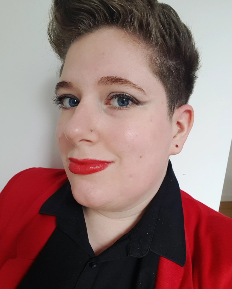 Selfie ahead of the staff network's first meeting. I'm weaing my red blazer and matching lipstick, but this time have on a plain black shirt.